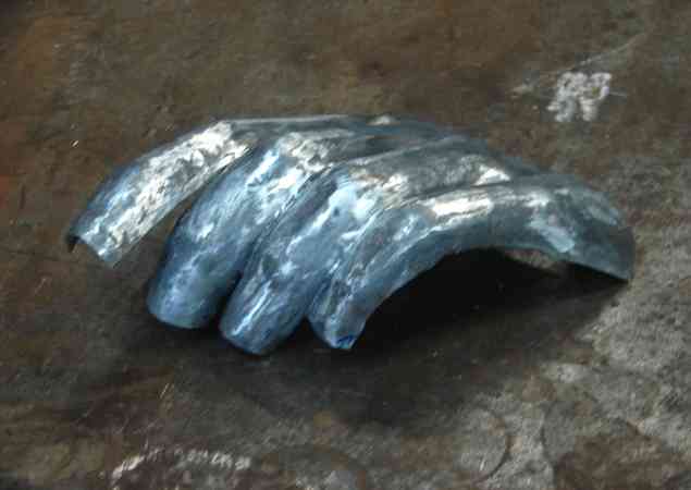 the rest of the back of he fingers formed and soldered together