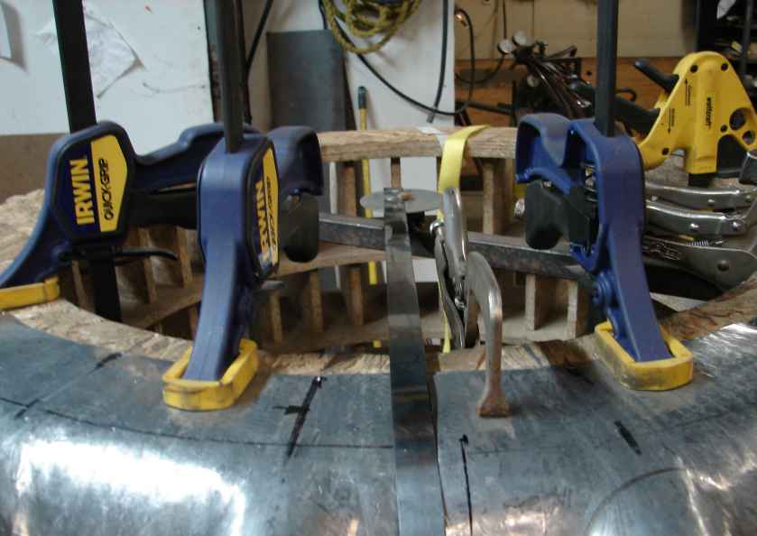 rotating flexible straight edge to mark cut lines.